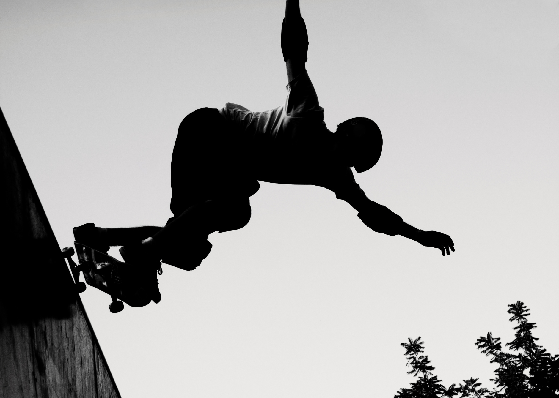 Silhouette of person skateboarding